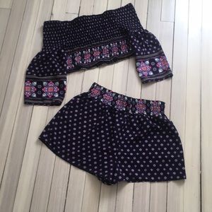 Off the shoulder shirt and high waisted shorts!